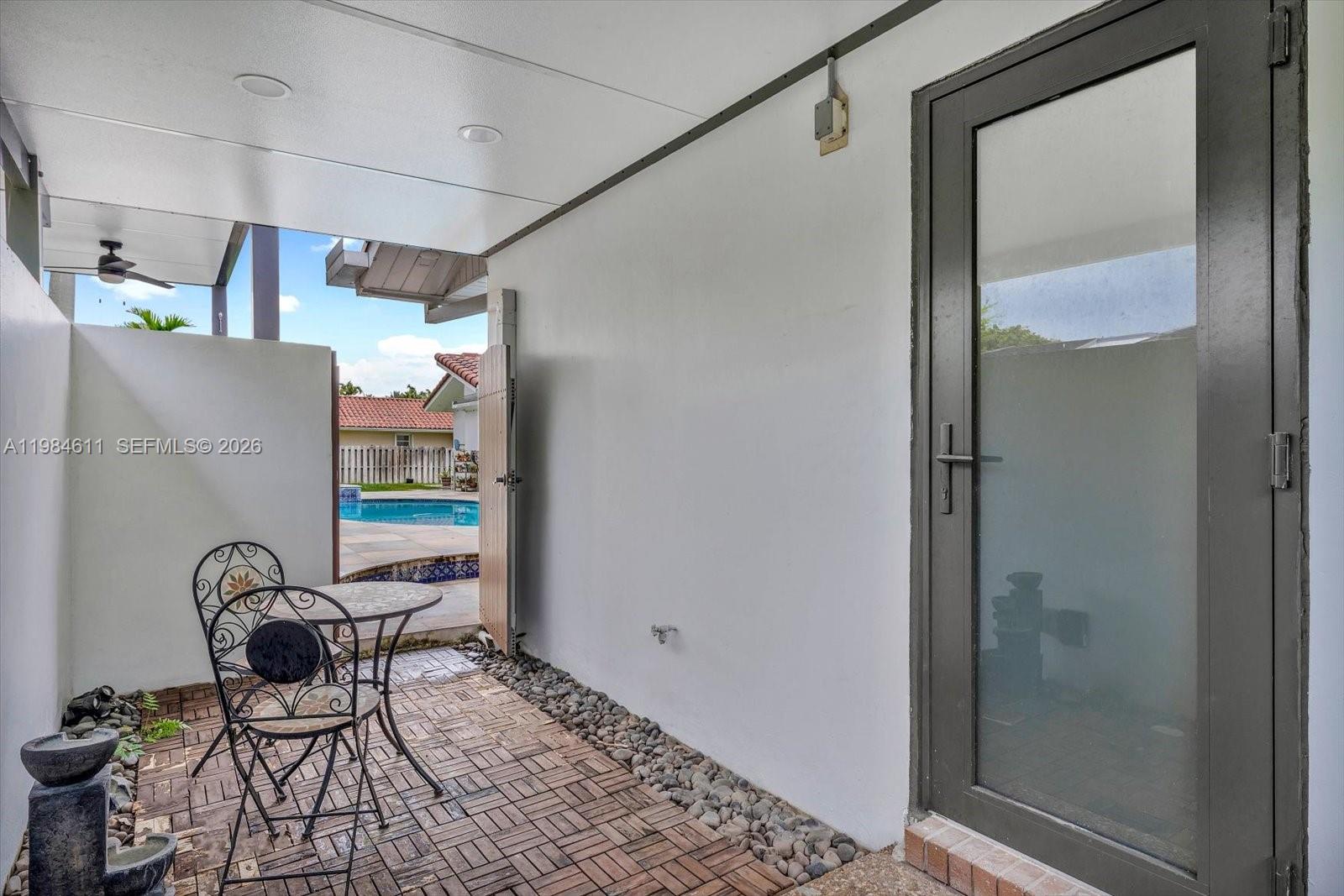 10126 Southwest 93rd Place Miami, FL 33176 - Photo 17 of 27 a work place with table and chairs