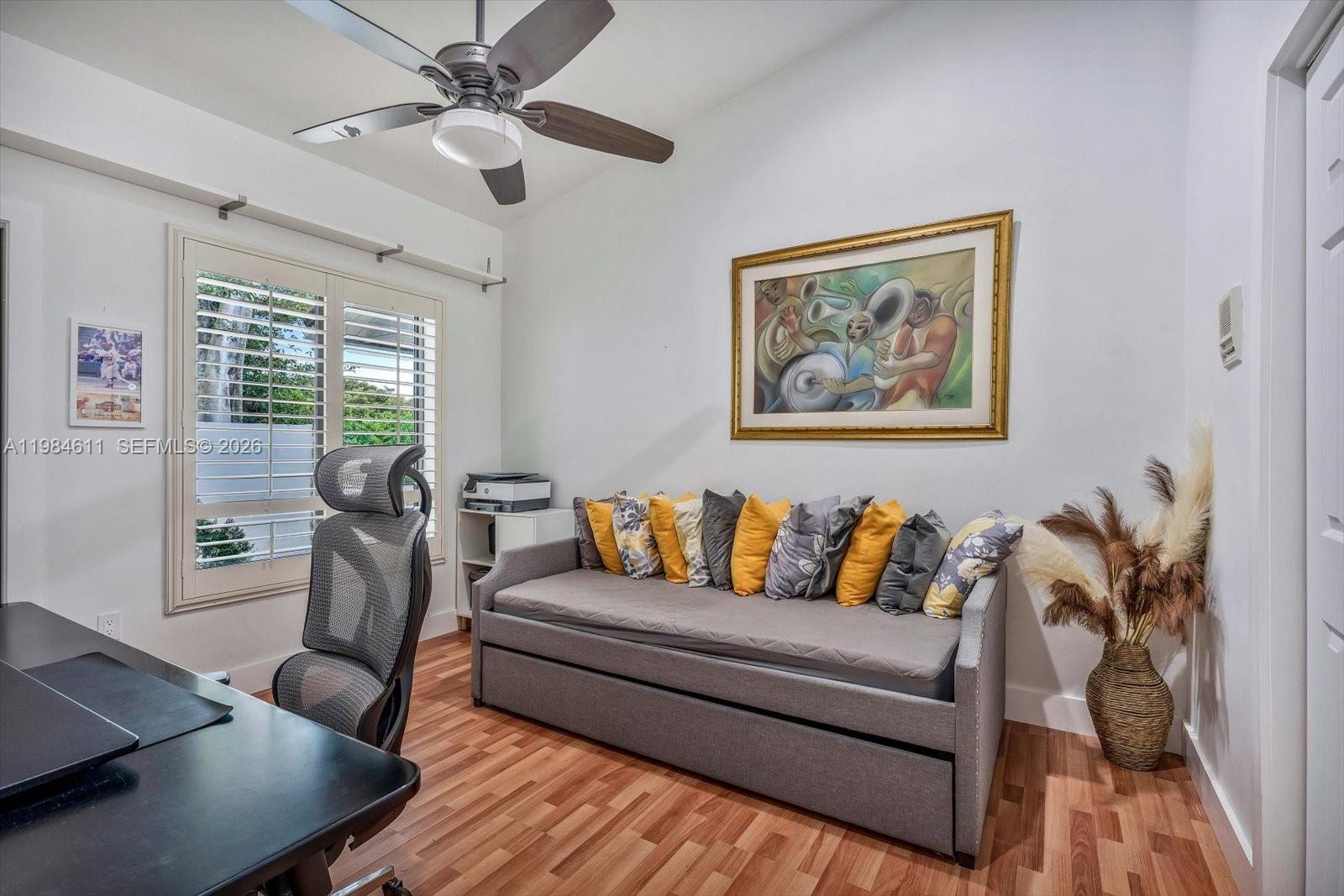 10126 Southwest 93rd Place Miami, FL 33176 - Photo 25 of 27 a living room with furniture and a large window