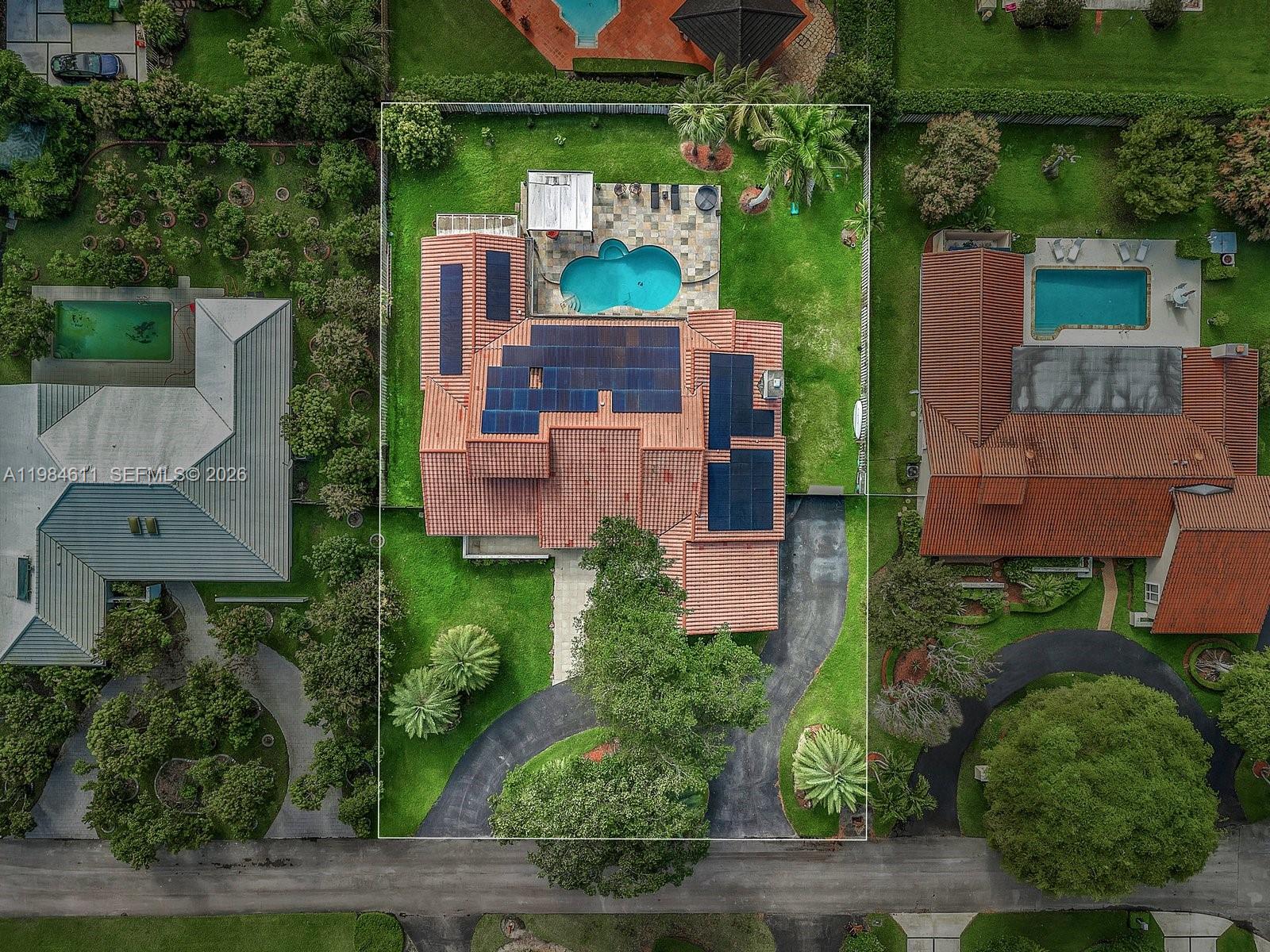10126 Southwest 93rd Place Miami, FL 33176 - Photo 27 of 27 an aerial view of a house with yard swimming pool and outdoor seating