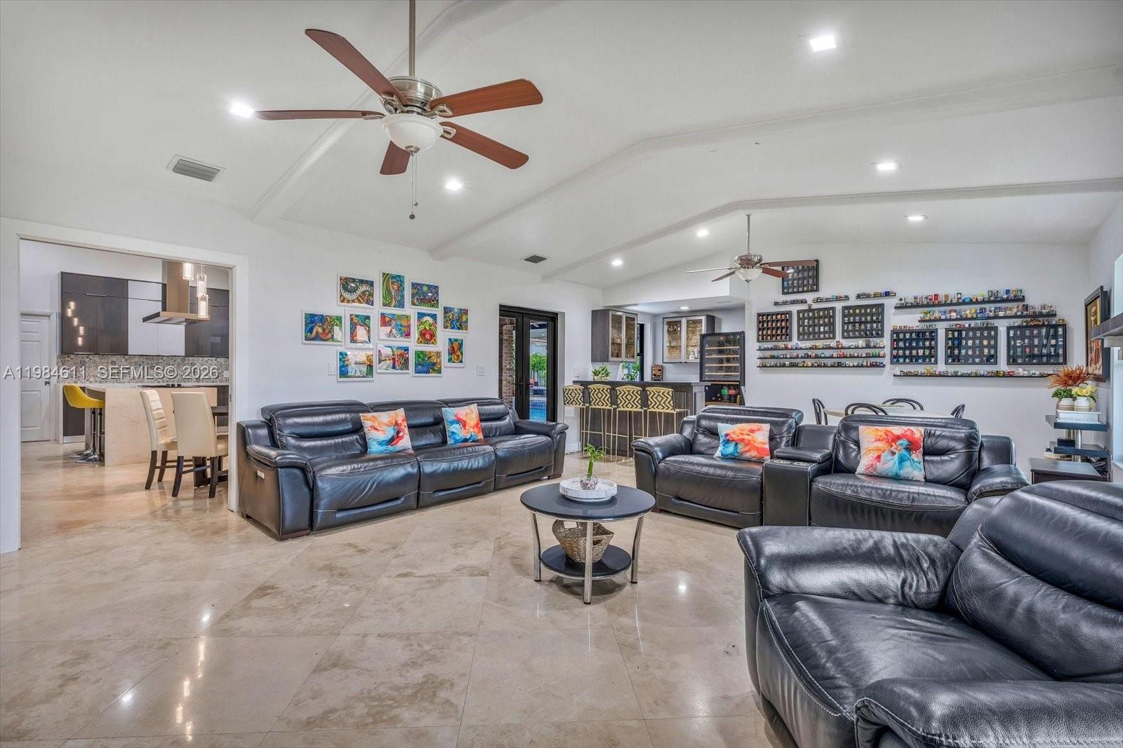 10126 Southwest 93rd Place Miami, FL 33176 - Photo 10 of 27 a living room with furniture and a ceiling fan