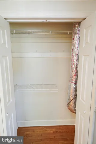 a bathroom with a sink toilet and mirror