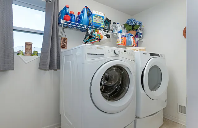 a utility room with dryer and washer