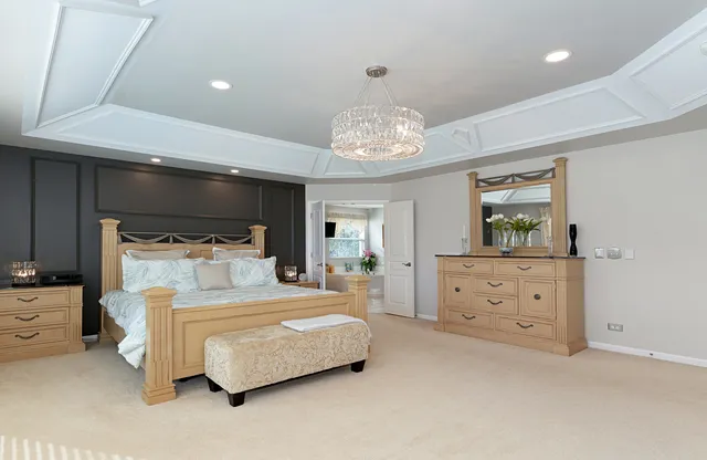 a spacious bathroom with a bathtub and a shower