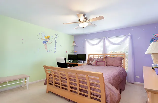 a living room with lots of furniture and a chandelier