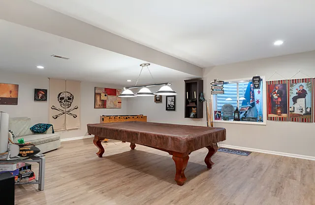 a bathroom with a double vanity sink mirror double and toilet