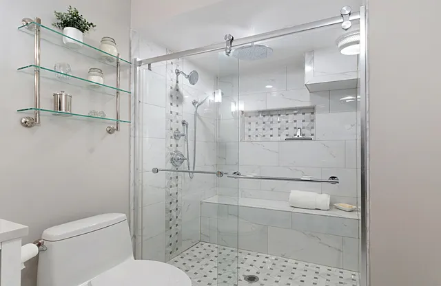 an aerial view of a house with a lake view