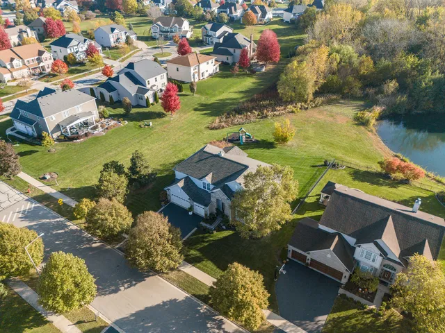 an aerial view of residential house with outdoor space