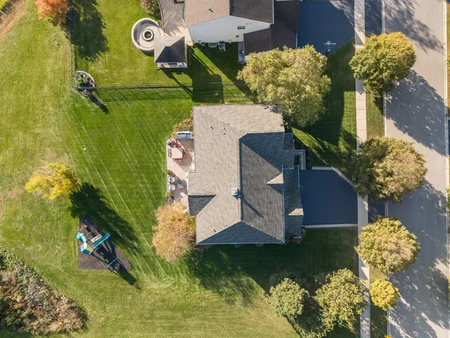 a view of a patio with couches and potted plants
