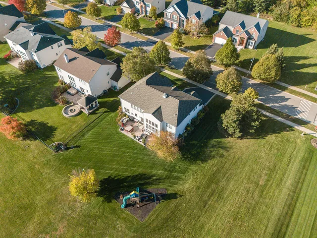a view of a chairs and table in the patio