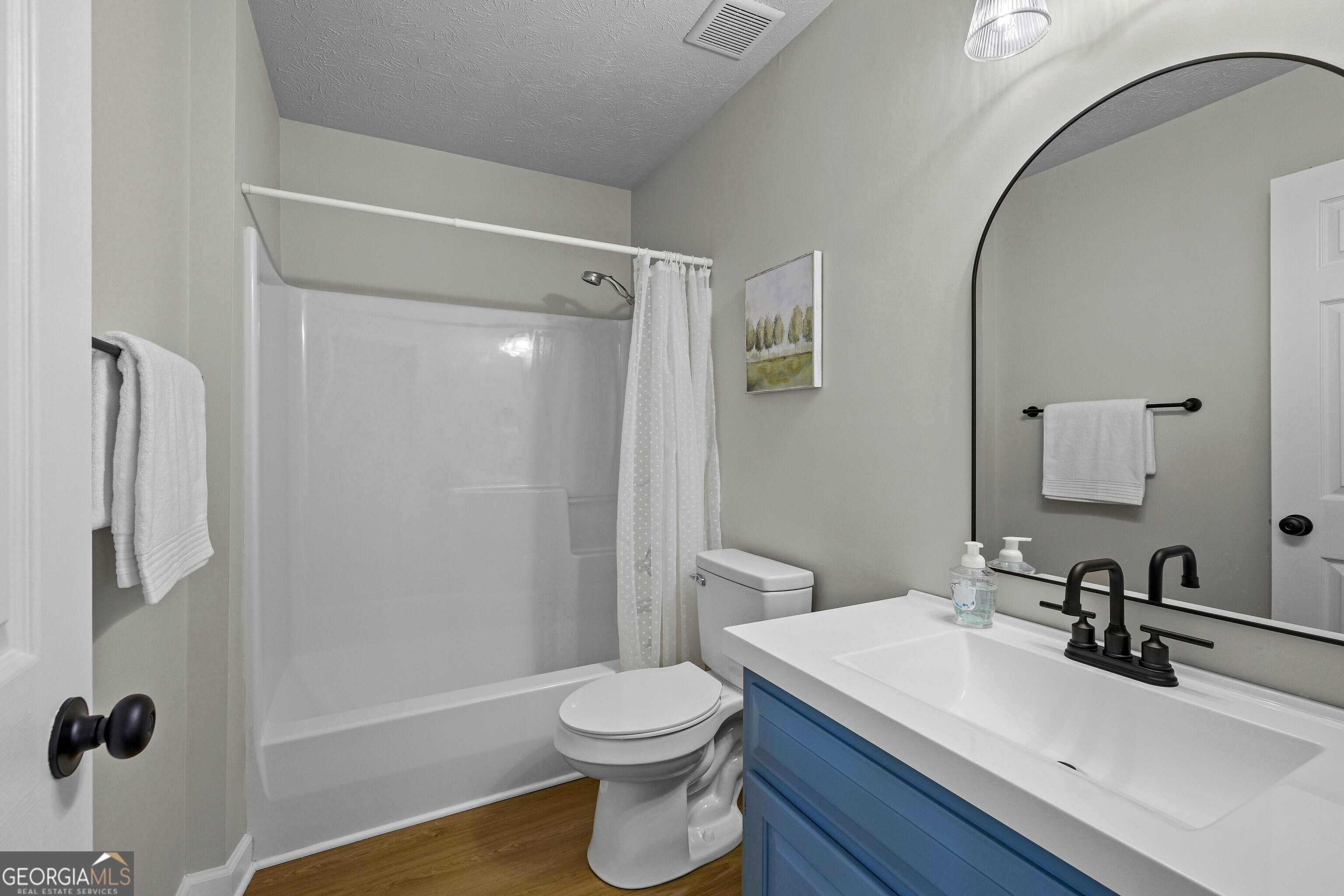 40 River Point Drive LaGrange, GA 30240 - Photo 12 of 22 a bathroom with a sink a toilet and shower