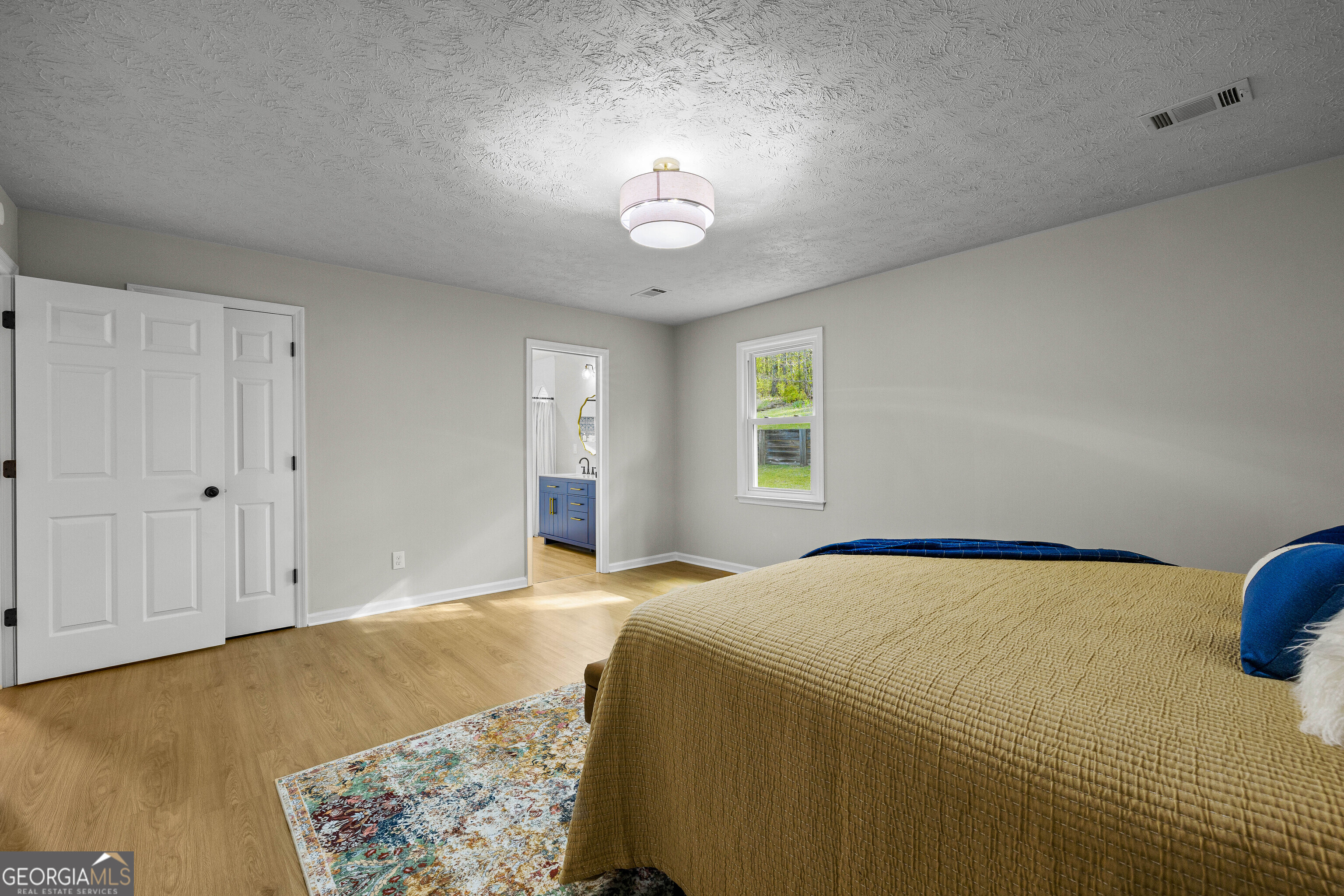 40 River Point Drive LaGrange, GA 30240 - Photo 14 of 22 a bedroom with a bed and a window