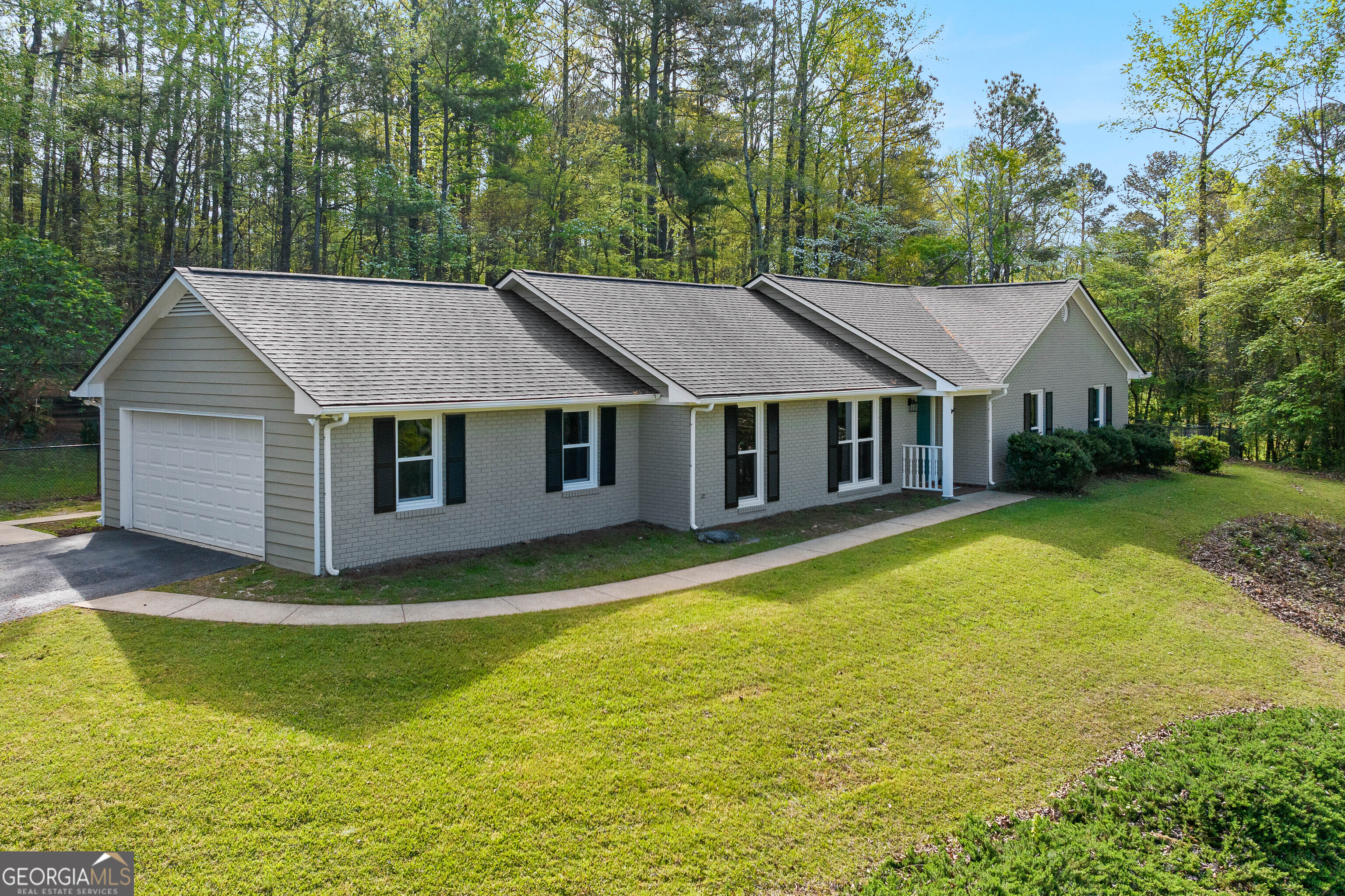 40 River Point Drive LaGrange, GA 30240 - Photo 2 of 22 a view of a house with swimming pool and a yard