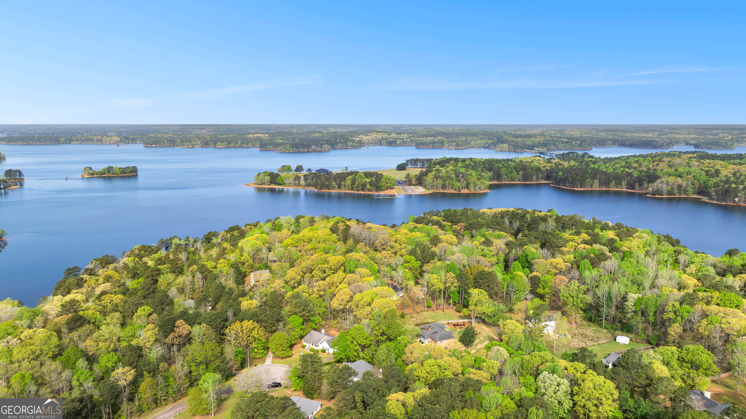 40 River Point Drive LaGrange, GA 30240 - Photo 21 of 22 a view of a lake with houses in the back