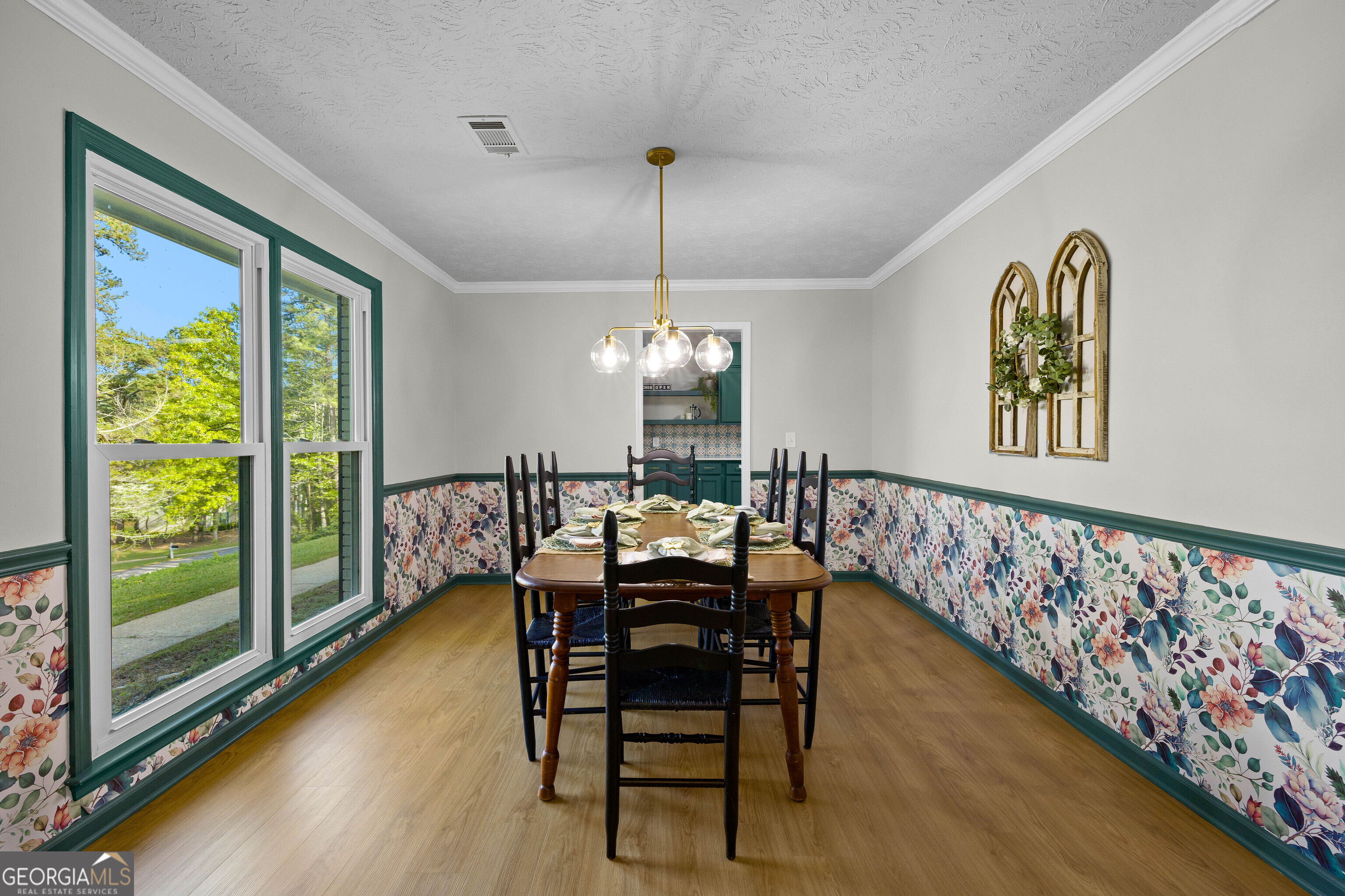 40 River Point Drive LaGrange, GA 30240 - Photo 5 of 22 a dining room with furniture a chandelier and wooden floor