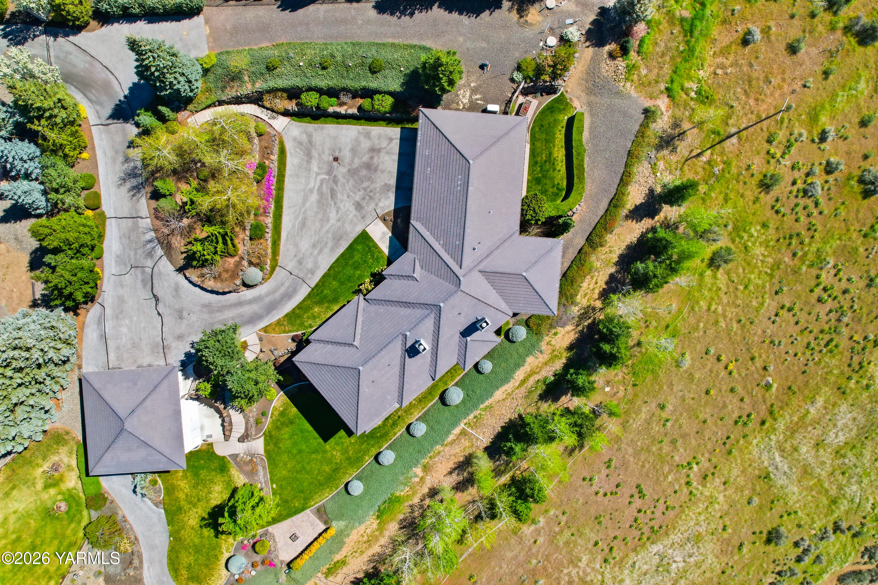 660 Noble Hill Road Yakima, WA 98908 - Photo 57 of 63 an aerial view of a house with a garden