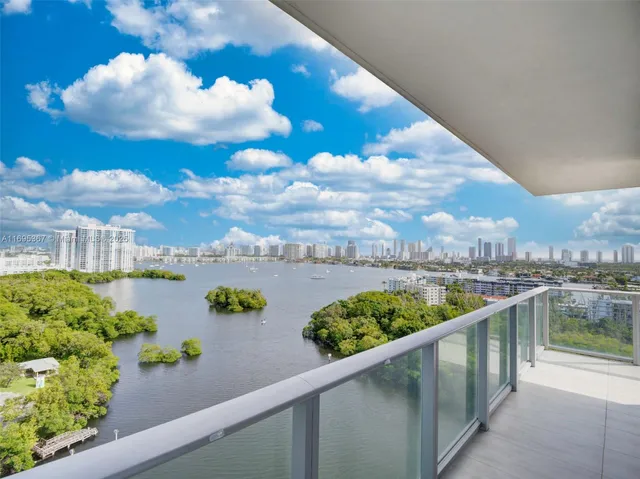 a view of a lake from a balcony