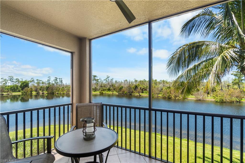 9820 Giaveno Circle, Unit 1422 Naples, FL 34113 - Photo 13 of 36 a view of a city from a balcony