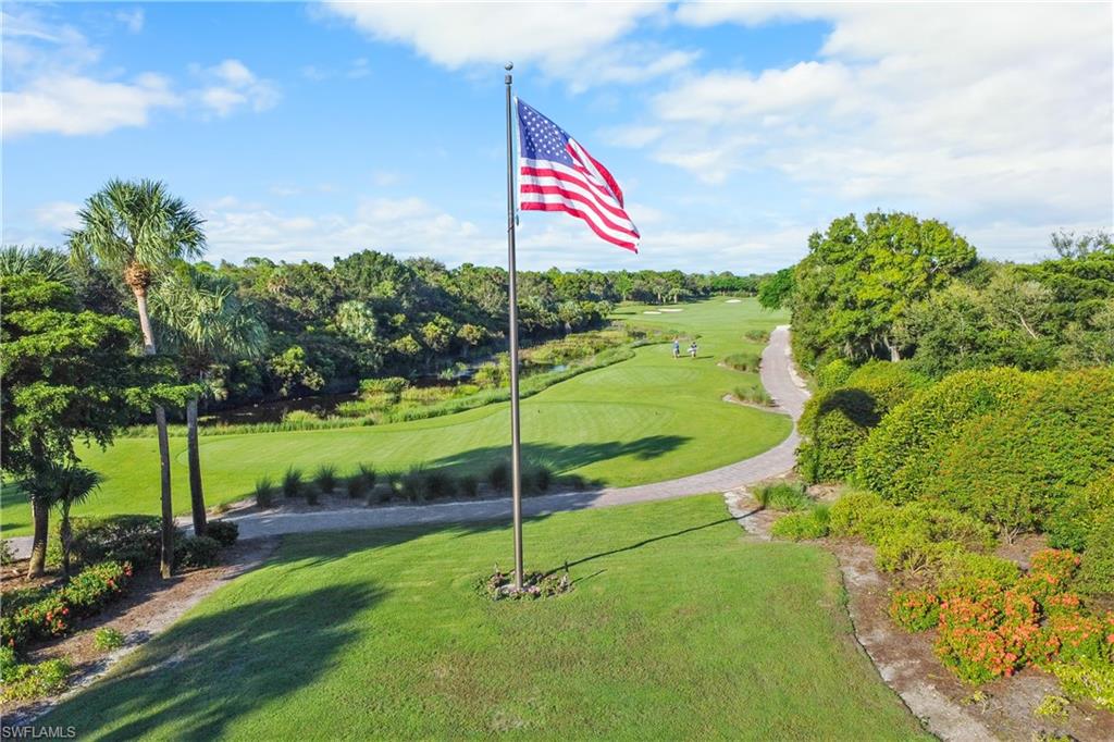 9820 Giaveno Circle, Unit 1422 Naples, FL 34113 - Photo 32 of 36 a view of a park