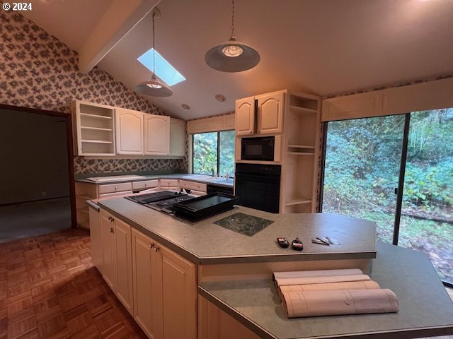 2890 Warren Street Eugene, OR 97405 - Photo 11 of 46 a stove top oven sitting inside of a kitchen