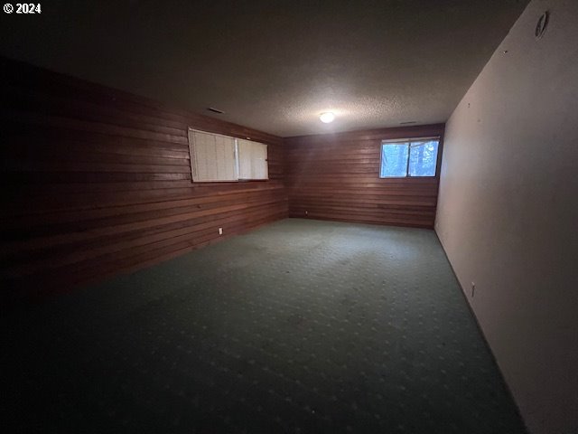 2890 Warren Street Eugene, OR 97405 - Photo 27 of 46 a view of empty room with wooden floor and fan