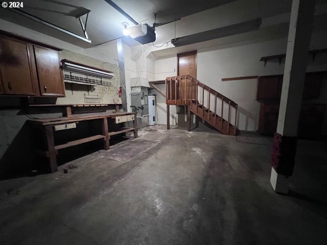 2890 Warren Street Eugene, OR 97405 - Photo 32 of 46 a kitchen with stainless steel appliances kitchen island granite countertop a stove and a sink