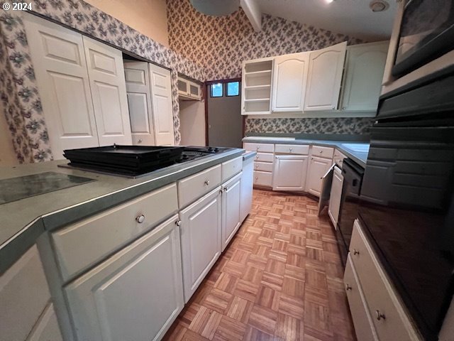 2890 Warren Street Eugene, OR 97405 - Photo 10 of 46 a kitchen with granite countertop a sink a stove and cabinets