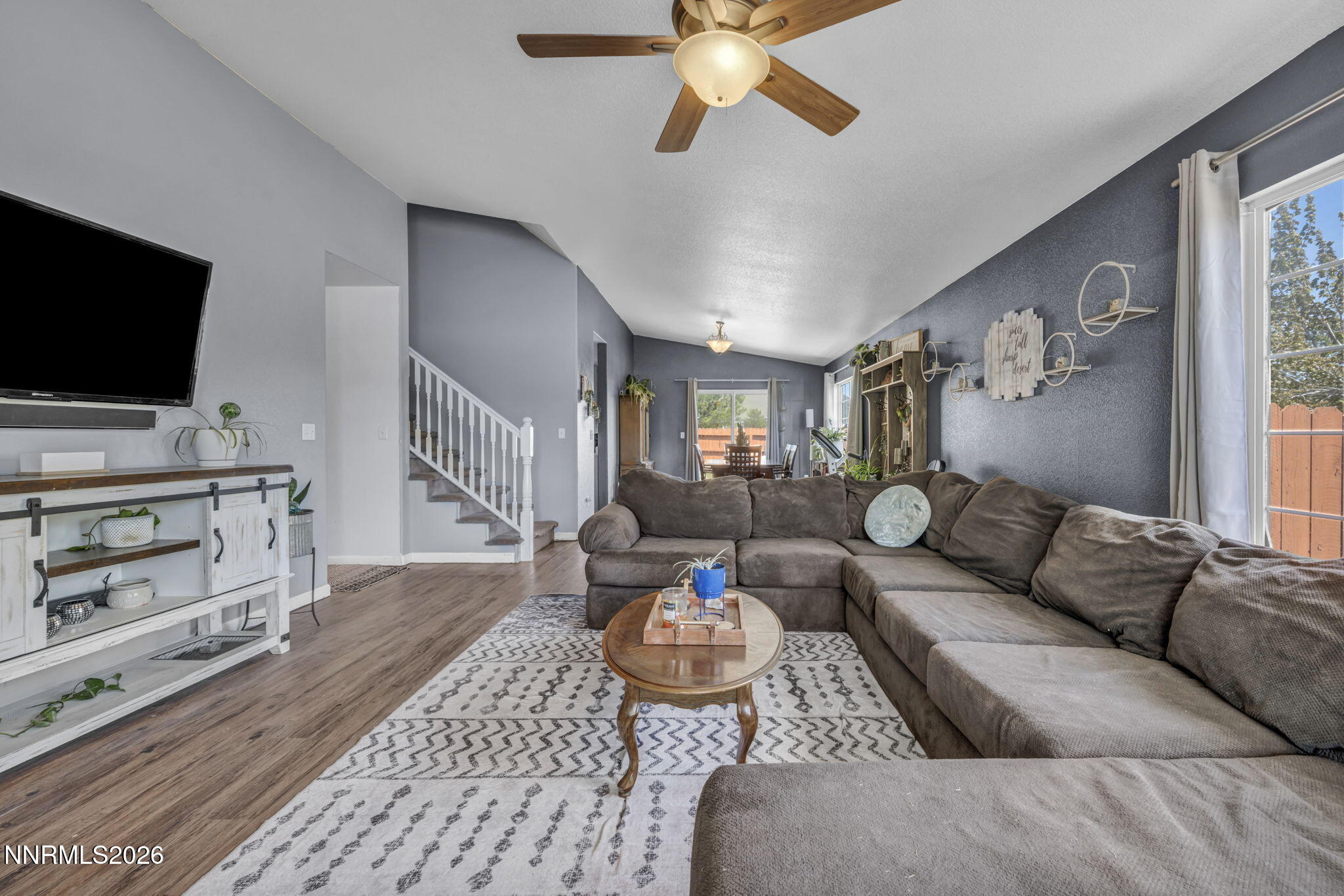 17615 Baileyville Court Reno, NV 89508 - Photo 3 of 19 a living room with furniture and a flat screen tv