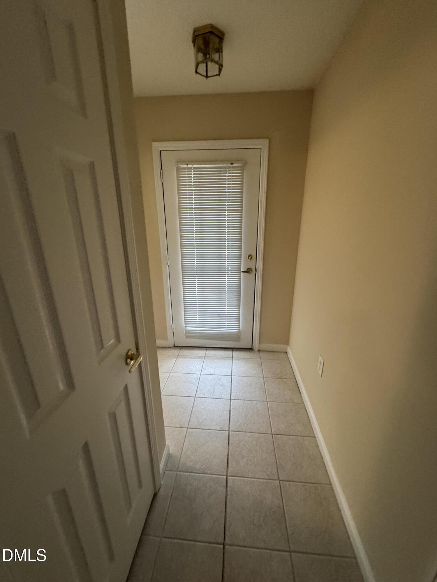 Undisclosed Address Raleigh, NC 27617 - Photo 3 of 22 a view of an entryway