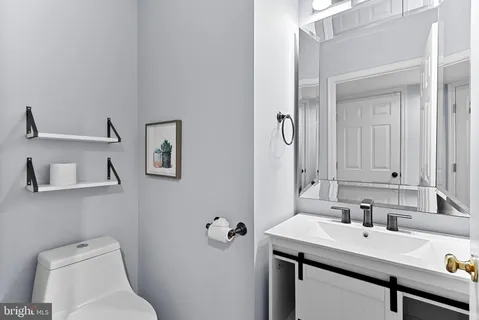 a view of a livingroom with a lounge chair