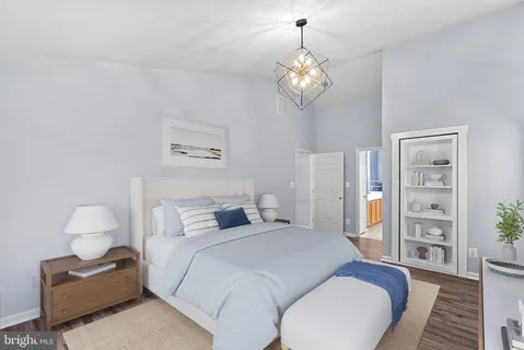 a bathroom with a sink double vanity and a toilet