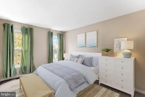 a view of a workspace with furniture