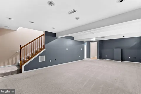 a view of an empty room with a balcony