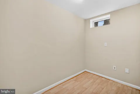 a view of a house with a backyard and a table chair