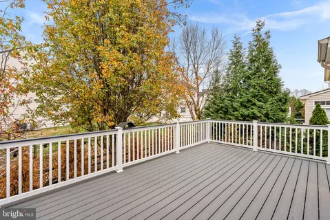 an aerial view of residential building and lake