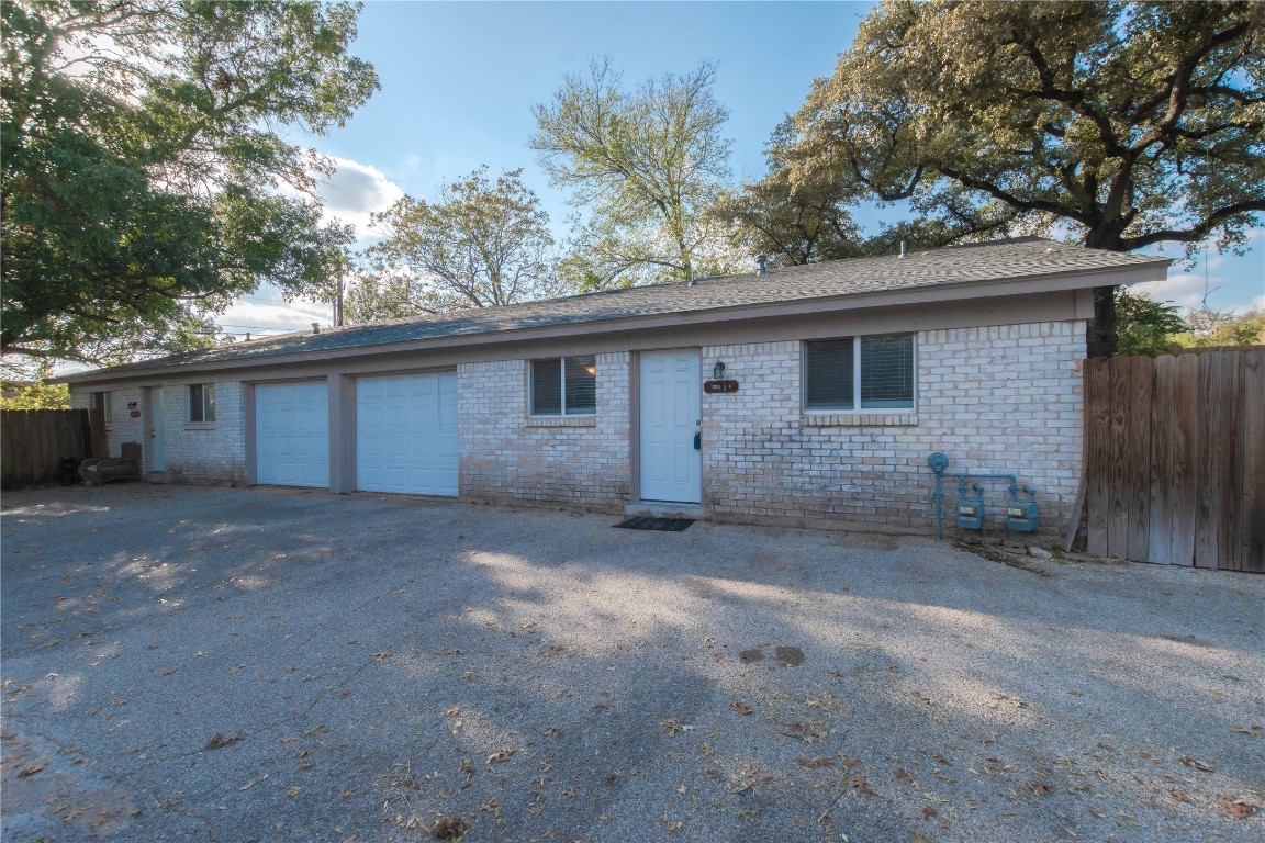 2005 Matthews Lane, Unit 2 Austin, TX 78745 - Photo 1 of 25 a view of a house with a yard and large tree