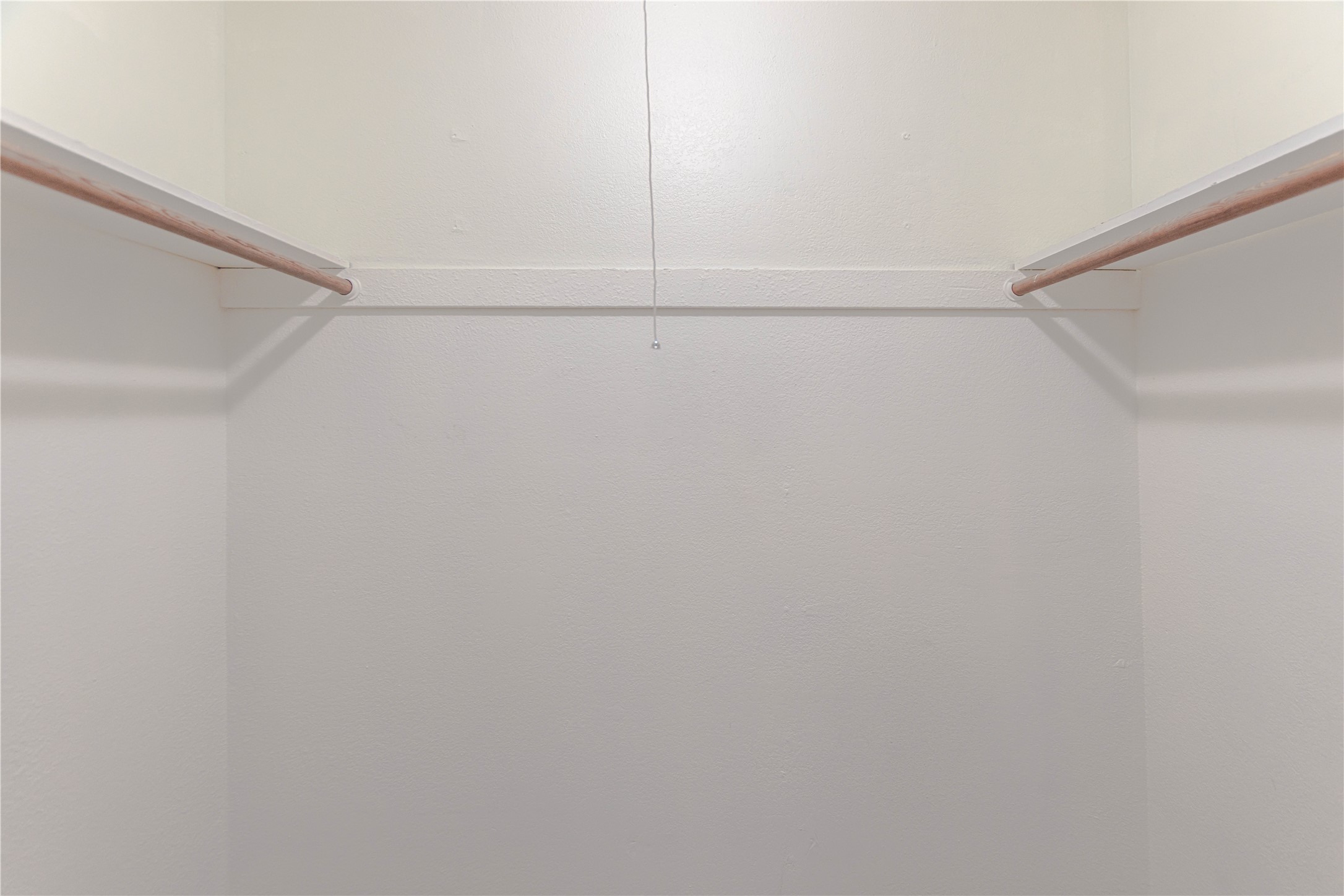 2005 Matthews Lane, Unit 2 Austin, TX 78745 - Photo 16 of 25 a view of a room with racks on the wall