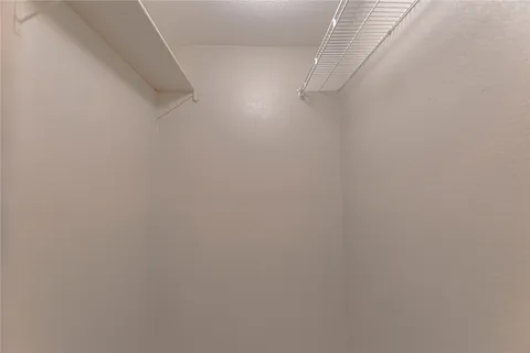 a view of small space with racks on the wall