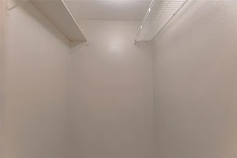 a view of small space with racks on the wall