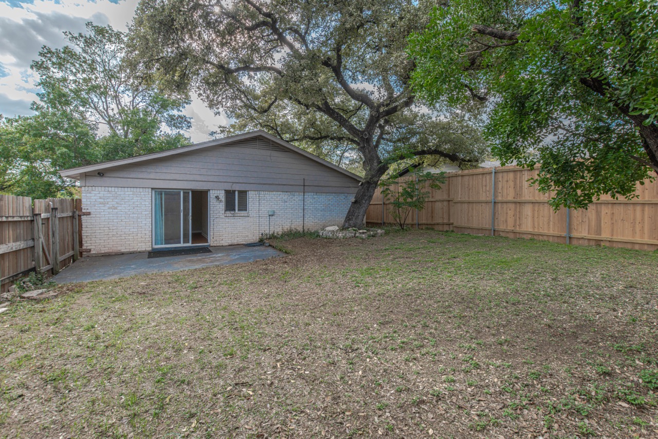 2005 Matthews Lane, Unit 2 Austin, TX 78745 - Photo 22 of 25 a house with a tree in front of the house