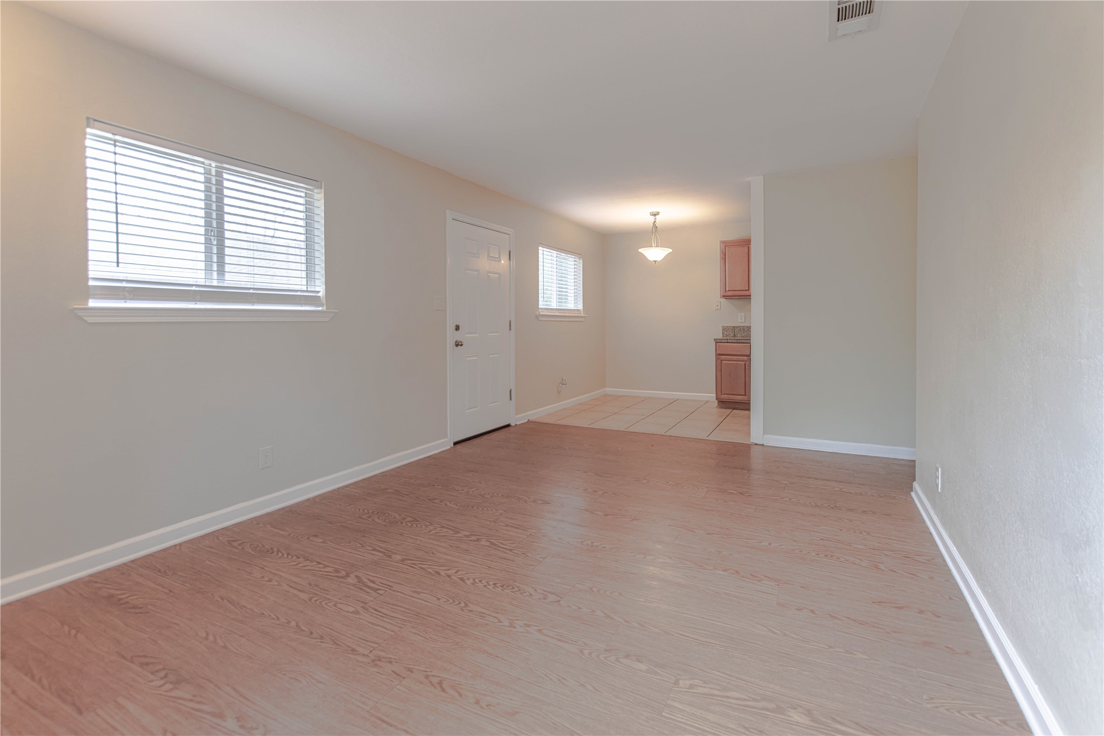2005 Matthews Lane, Unit 2 Austin, TX 78745 - Photo 8 of 25 an empty room with windows
