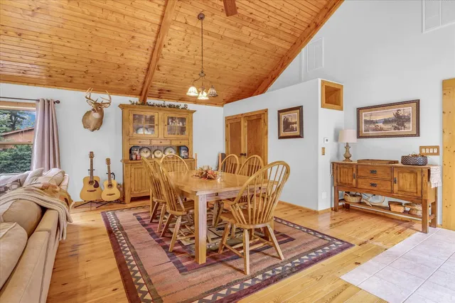 a kitchen with stainless steel appliances granite countertop a refrigerator a stove and a sink with large countertops