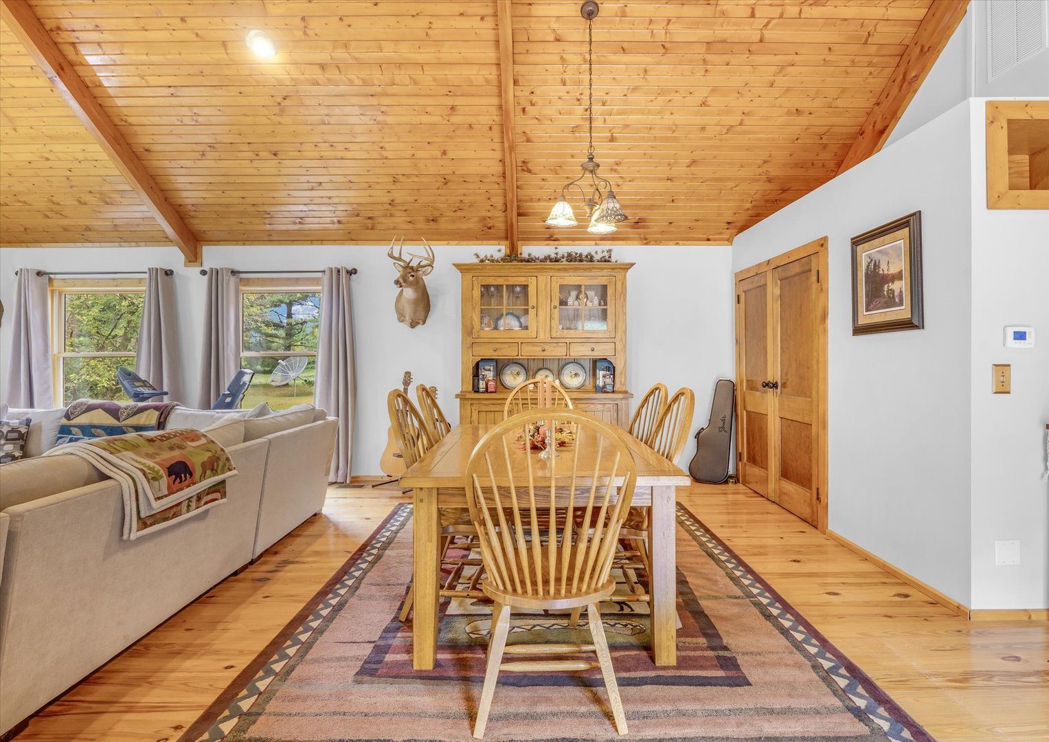 15262 North 450 East Road Fithian, IL 61844 - Photo 21 of 66 a view of a dining room with furniture a chandelier and wooden floor
