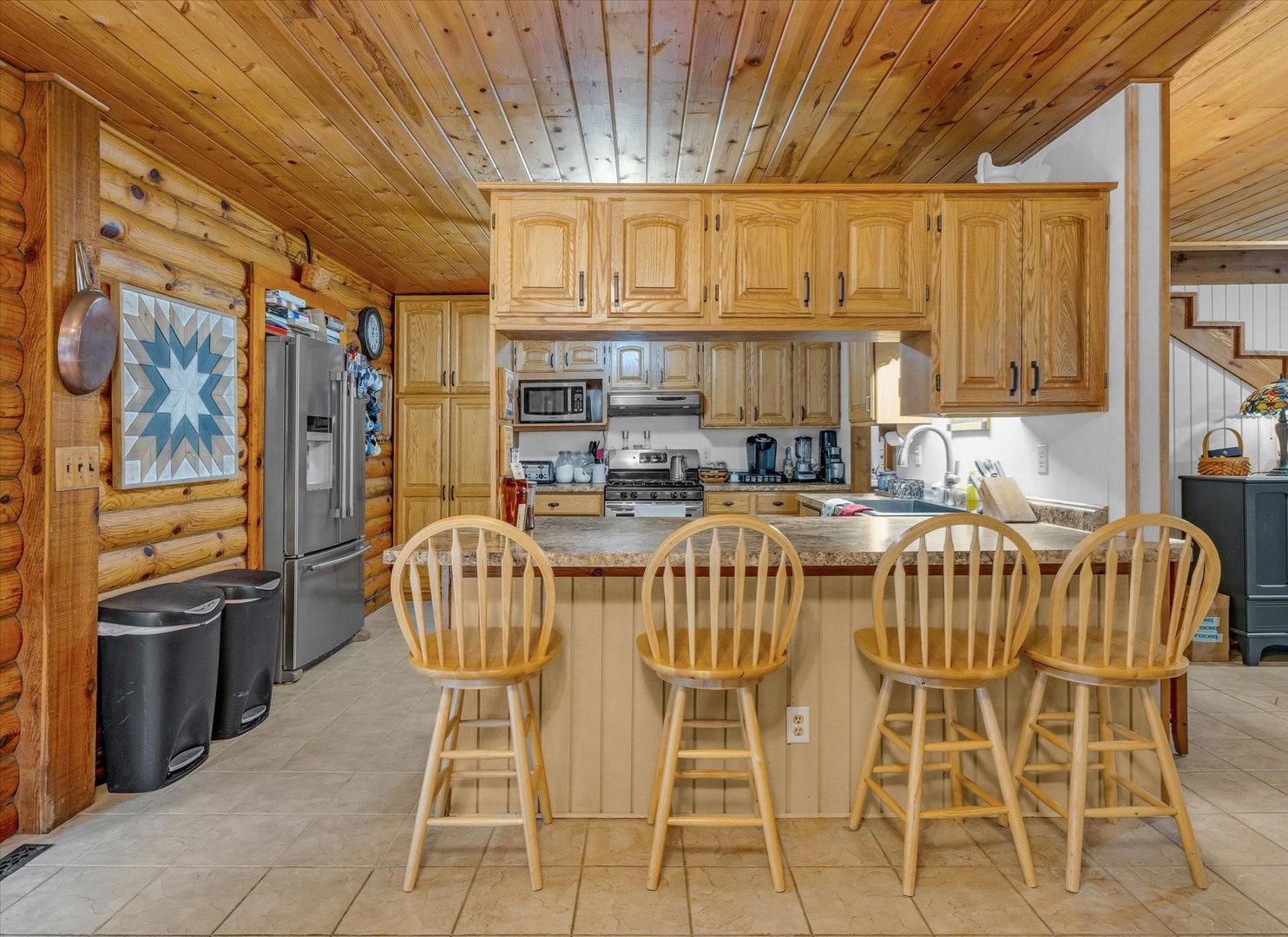 15262 North 450 East Road Fithian, IL 61844 - Photo 25 of 66 a kitchen with stainless steel appliances granite countertop a dining table and chairs