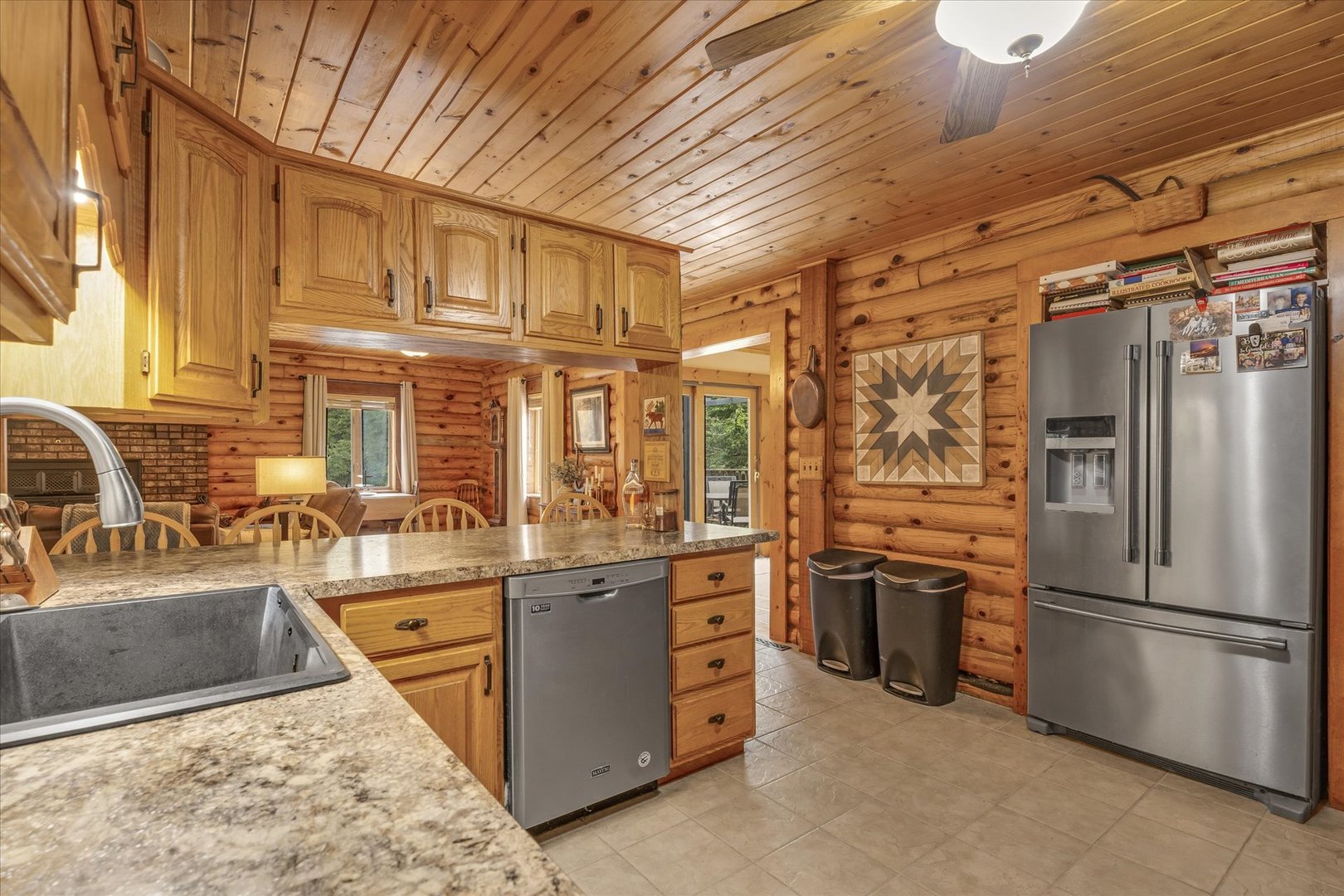 15262 North 450 East Road Fithian, IL 61844 - Photo 27 of 66 a kitchen with stainless steel appliances granite countertop a refrigerator a stove and a sink with large countertops