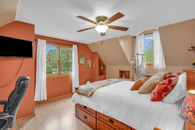 a view of a chairs and table in the balcony