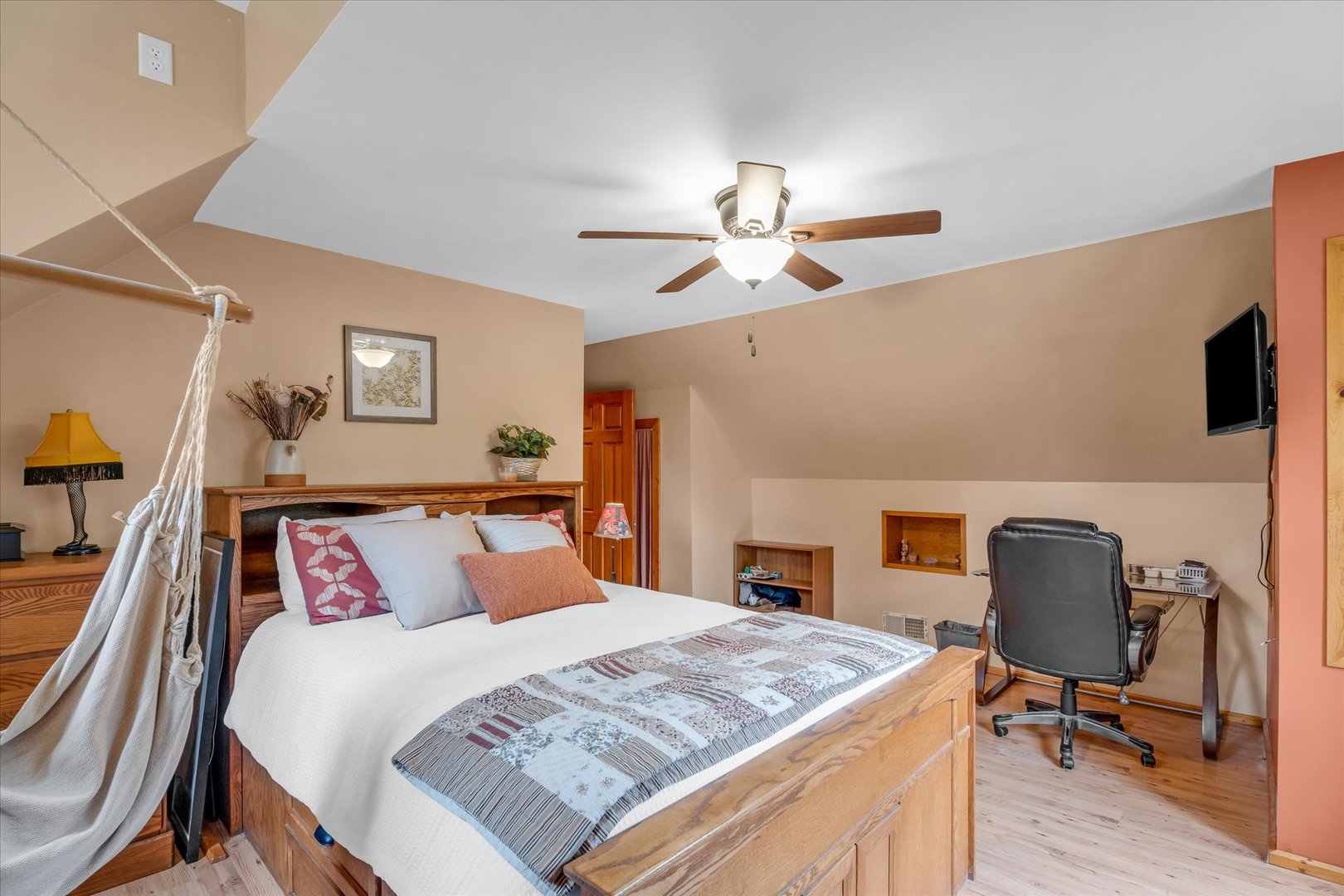 15262 North 450 East Road Fithian, IL 61844 - Photo 40 of 66 a bedroom with a large bed and a chandelier