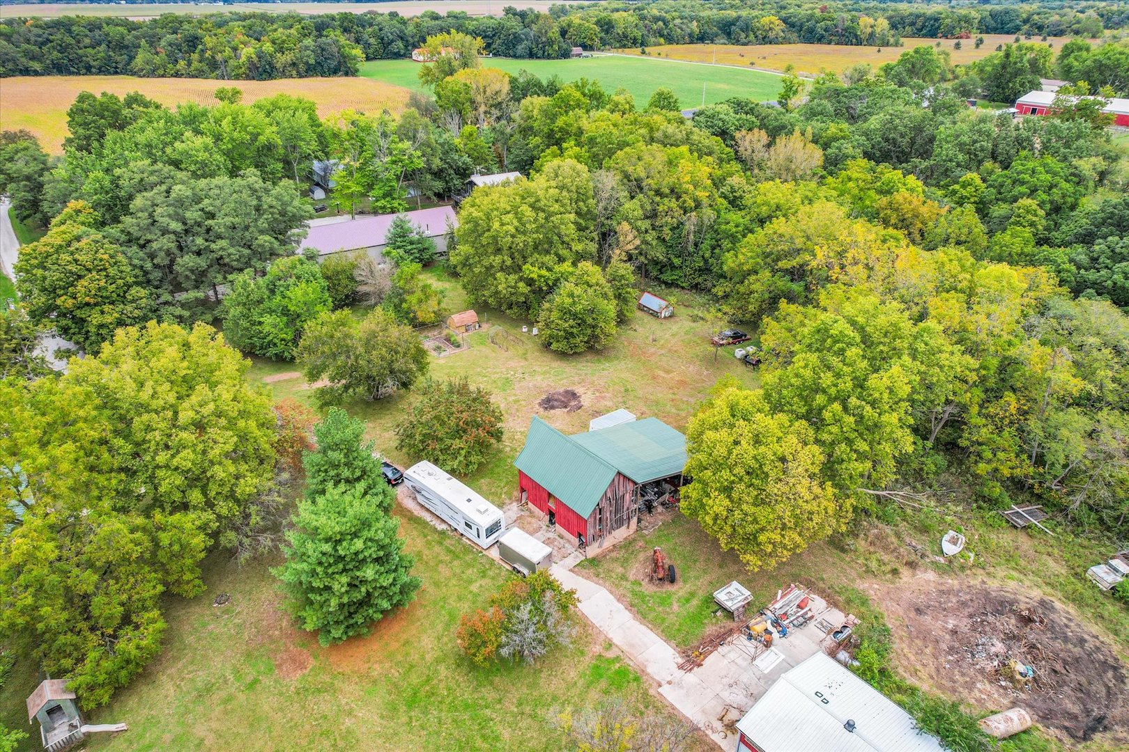 15262 North 450 East Road Fithian, IL 61844 - Photo 59 of 66 an aerial view of residential houses with outdoor space and trees