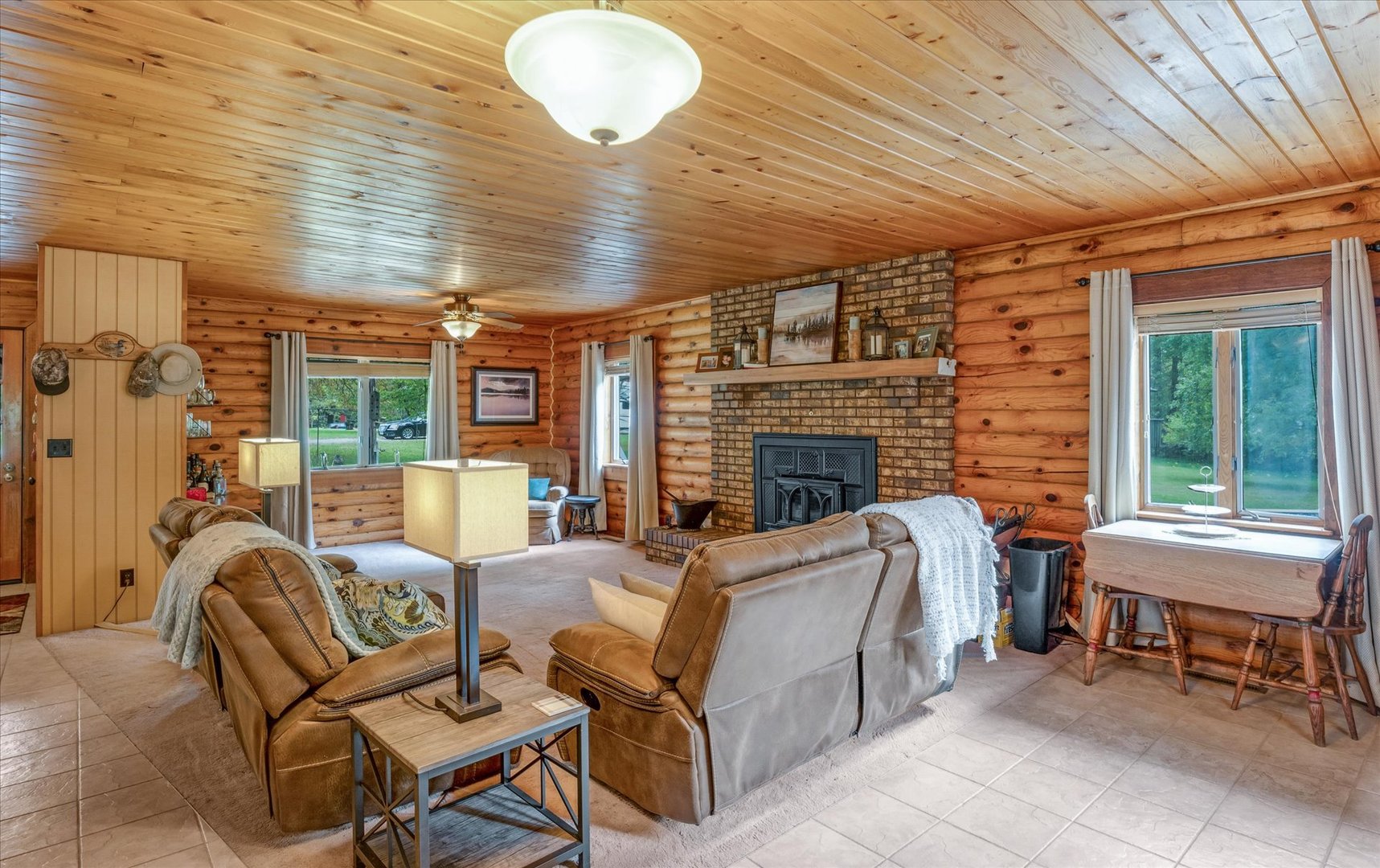15262 North 450 East Road Fithian, IL 61844 - Photo 8 of 66 a living room with furniture wooden floor and a fireplace