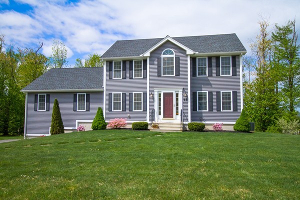 13 Clealand Circle Rutland, MA 01543 - Photo 1 of 30 front view of a house with a yard