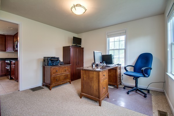 13 Clealand Circle Rutland, MA 01543 - Photo 13 of 30 a view of a workspace with furniture and a window